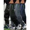 Pantalones de trabajo de moda de primavera y otoño transfronterizos de Amazon con cordón en el bolsillo para hombre, pierna recta, versátiles, casuales, largos, al por mayor, en stock