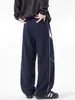Pantalones rectos de punto gofrado con costuras de contraste para hombre ACU, nuevos pantalones anchos casuales de tendencia de marca para otoño/invierno 2026, pantalones curvos