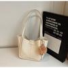 Bolsa pequena costurada popular deste ano para mulheres 2025 nova bolsa de verão infantil moda artística textura ombro axila
