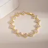 Pulseira Cruzada Venda Quente Retro Totalmente Diamantada Inlay de Cobre Zircônia Trevo de Quatro Folhas Flor de Zircônia Multicolorida Pulseira Banhada a Ouro de Luxo Leve para Mulheres