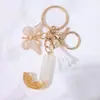 Llavero Colgante de Borla con Letra Inglesa Personalizada de Purpurina Blanca con Resina Epoxi y Colgante de Resina con Pan de Oro, Llavero Sencillo