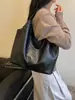 Bolso de axila tejido de PU de alta gama para mujer, nuevo bolso de axila de moda para otoño/invierno 2026, bolso tote para ir al trabajo