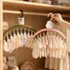 Lindo tendedero de calcetines con forma de conejo para uso doméstico, tendedero de secado de ropa interior y calcetines a prueba de viento para balcón con múltiples clips, una herramienta mágica para secar