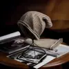 Cachemira 2026 Otoño/Invierno Nuevo para Mujer de Alta Gama Tejido de Punto Cálido para Exteriores Protección de Orejas Cable de Punto Casual Gorro Envolvente para la Cabeza