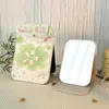56458 Personas Añadidas al Carrito Espejo de Maquillaje Plegable Tulipán Tamaños Grande y Pequeño para Dormitorio Pantalla de Escritorio Portátil Venta al por Mayor