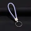 Joyería Tejida Creativa Llavero de Cuerda de Cuero Colgante para Coche Llavero de Cuerda de PU para Pareja Pequeño Regalo Fabricante Bolsa