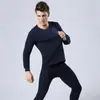 Conjunto de roupa íntima de cor sólida com gola redonda outono e inverno gola média masculina roupas quentes de outono calças de outono preço baixo escovado adicionado veludo espessado escovado