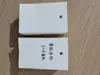 Etiqueta de tela lavada en blanco con puntos, impermeable, resistente al desgarro, tela de nailon, recubrimiento sintético, proceso de logo personalizado, etiqueta, tarjeta