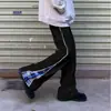 Calças largas plus size, com design de padrão xadrez patchwork estiloso, adequadas para homens e mulheres, e perfeitas para primavera e outono