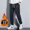 Pantalones gruesos con forro de felpa de chenilla para hombre, pantalones casuales de otoño e invierno para el trabajo, pantalones deportivos de chándal, pantalones de pana modernos