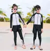 Traje de baño Pantalones de manga larga para niños y niñas Nuevo Protección solar Secado rápido Traje de buceo dividido Traje de baño