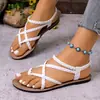 Sandalias planas tejidas de chanclas de comercio exterior europeo y americano para playa 2026 nuevas casuales transfronterizas talla grande sin cordones para mujer