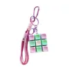 Llavero colgante de Tetris de nueve teclas de moda en colores macaron, accesorio de juguete de botón para aliviar el estrés, venta al por mayor
