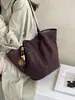 Bolso tote de hombro único retro europeo y americano para mujer, nuevo súper popular 2026, bolso de mano simple, bolso de axila para commuting