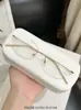 Nuevo y elegante armazón de anteojos sin montura de titanio puro con borde cortado, popular armazón de anteojos semi-titanio ultraligero, anti-luz azul, apto para lentes de prescripción