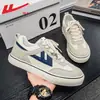 Tenis blancos para hombre de arrastre, nuevos zapatos de lona de primavera 2026, zapatillas casuales de entrenamiento alemanas, tenis deportivos para hombre