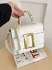 Bolso de mano texturizado transfronterizo 2026 nuevo de verano para mujer bolso vintage de alta gama bandolera con decoración de cinturón bolso cruzado