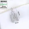 Colgante de letra pequeña estilo Chanel con perla Dai Guo Accesorios para joyería DIY Cobre electrochapado Cristal Accesorios de piedra natural