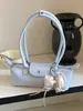 2026 Nuevo Bolso de Larga Asa Estilo Francés de Nicho de Lujo, Bolso Media Luna Baguette, Bolso de Hombro Único, Bolso Dumpling, Bolso de Axila