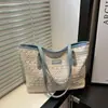 Bolsas para Mujer Bolso de Paja de Verano Estilo Nuevo Gran Capacidad Tejido Hueco Moda Bolso de Mujer Textura Bolso de Viaje
