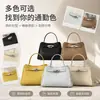 Nova bolsa de mão feminina em couro genuíno, bolsa de ombro e crossbody casual e versátil, bolsa Kelly de alta qualidade simples e luxuosa para exportação