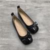Sapatos de feijão saia feminina 2025 primavera e outono laço novos sapatos vermelhos baixos sola macia boca baixa sapatos de concha