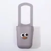 Portavasos de silicona popular y adorable para cochecito de bebé, silla de ruedas para bicicleta y pasamanos de piscina - una bolsa de taza de silicona multifuncional