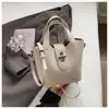 Bolso Único Texturizado Bolso Tote Pequeño para Mujer 2026 Nuevo Bolso Cubo Simple Versátil Bolso de Hombro Cruzado Bolso de Moda