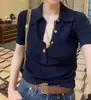 Camiseta blanca de punto de manga corta para mujer con cuello polo estilo francés, top versátil de verano de alta gama ajustado