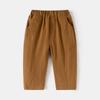 Pantalones para niños al por mayor 2025 nuevos pantalones casuales de color sólido para niños pantalones de moda para bebés coreanos una generación de cabello