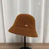 Nuevo sombrero de estilo coreano para otoño e invierno para mujer, sombrero tipo cubo casual para exteriores, color liso, simple y elegante, sombrero de pescador engrosado, moderno