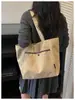 Bolso de lona texturizada de gran capacidad patchwork casual vintage modelo nuevo 2026 bolso de hombro simple versátil para mamá y para ir al trabajo