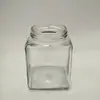 Suministro de fábrica Botella de vidrio redonda cuadrada de 500 ml Frasco para pepinillos frasco para miel boca de botella botella de vidrio sellada