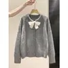 Cárdigan de punto con lazo de encaje para mujer, otoño e invierno, con botones en forma de corazón, suéter de corte holgado, top suave y femenino, prenda de abrigo