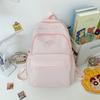 Mochila Escolar Primária Grande Capacidade Estilo College Feminina Casual Versátil Nylon Leve e Redutora de Peso Mochila para Alunos do Ensino Fundamental