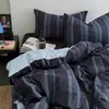 Juego de ropa de cama de cuatro piezas de algodón puro estilo Muji sábana de algodón funda de edredón rayas blancas y negras sensación de lujo ligero alta gama ropa de cama juego de tres piezas para dormitorio
