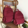 Mochila Casual Simple de Color Sólido Gran Capacidad Ligera Versátil Mochila de Viaje Hombres y Mujeres Exterior Estudiante Mochila Escolar Mujeres