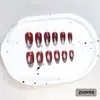 24 PIEZAS Colección de Arte para Uñas Bestseller Transfronterizo Navidad Halloween Flor Uñas Portátiles Ojo de Gato Halloween Piezas de Uñas Portátiles