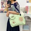 Bolso tote nuevo para estudiantes, gran capacidad, perfecto para sesiones de tutoría, diseño moderno color-blocking, patrón de dibujos animados lindo, gran capacidad, adecuado para ir al trabajo y llevar libros