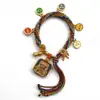 Pulseira do deus da riqueza de cinco vias estilo Xizang oito santos padroeiros cinco mestres Manjushri deus da riqueza amarelo thangka corda tecida à mão pulseira do ano desta vida