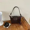 Bolso de Hombro Retro de Gamuza Mate Tipo Dumpling para Mujer 2026 Nuevo de Moda para el Trabajo de un Solo Hombro Cruzado Versátil Sensación de Alta Gama Bolso de Axila
