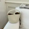 Bolso pequeño súper popular para mujer, nueva moda de verano 2026, exquisito bolso cubo de hombro y cruzado para el trabajo