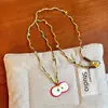 Collar trenzado de cachorro de dibujos animados de color dopamina para mujer, cadena colgante decorativa larga para cuello halter, accesorios