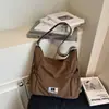 Versão Coreana da Ins Nova Bolsa Tote Simples de Cor Pura Estilo Preguiçoso de Alta Aparência para Mulheres Leve Bolsa Transversal de Grande Capacidade
