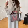 Bolso Pequeño Cuadrado Estampado Retro Europeo y Americano Transfronterizo para Mujer 2026 Nuevo Estilo Bolso de Hombro Cruzado Versátil de Alta Gama