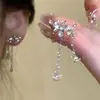 Brincos de Pérola Pétala Francesa para Mulheres 2026 Novo Estilo Quente Outono/Inverno Brincos de Tarraxa Estilo Resort Ornamentos de Orelha
