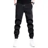 Pantalones de pana de otoño e invierno para hombre, pantalones casuales gruesos con forro polar para hombre, pantalones cónicos holgados de moda negros de talla grande