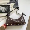 Bolso de hombro nuevo para mujer estilo transfronterizo, diseño de nicho, gran capacidad para uso diario, de mano o para llevar debajo del brazo