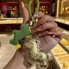 Nuevo Estilo Llavero "Caballo de Dinero" con Dorado, Llavero de Coche, Colgante para Bolso, Regalo del Año del Caballo