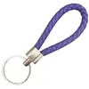 Llavero de cuerda de cuero trenzado simple creativo colgante de muñeca linda accesorios de llave para parejas tendencia regalos pequeños venta al por mayor